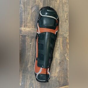 Unisex shinguards, orange and green, size 16, brand new